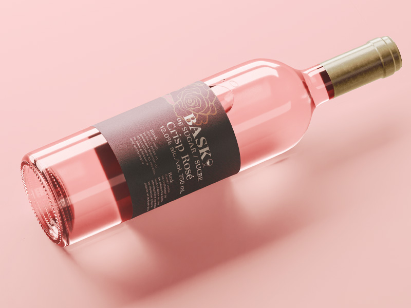 pink wine bottle with redesigned BASK Rose bellyband